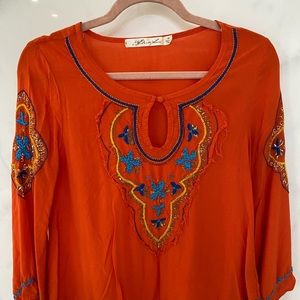 Orange funky everyday blouse.
